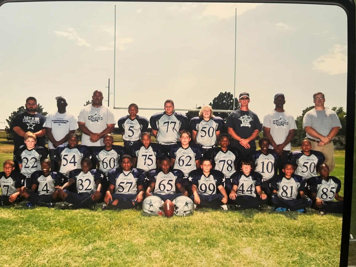 The Wichita Cowboys. Knowledge McPherson is No. 4; Wesley Adkins is No. 60; Kaleb Gaddis No. 44. Coach Mark Gaddis in third in from the top right.