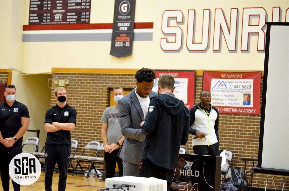 Buddy Hield, a shooting guard with the Sacramento Kings in the NBA, returned to Sunrise Christian Academy on Saturday to have his jersey retired.