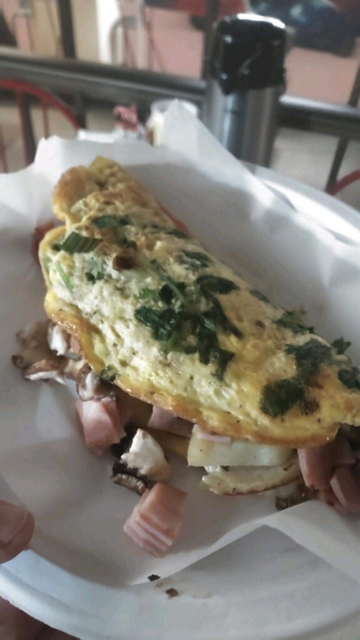 Veronica Laflin’s specialty is omelets, and she’s gained a following in the Garvey Center with her mobile business called Omelette Pages.