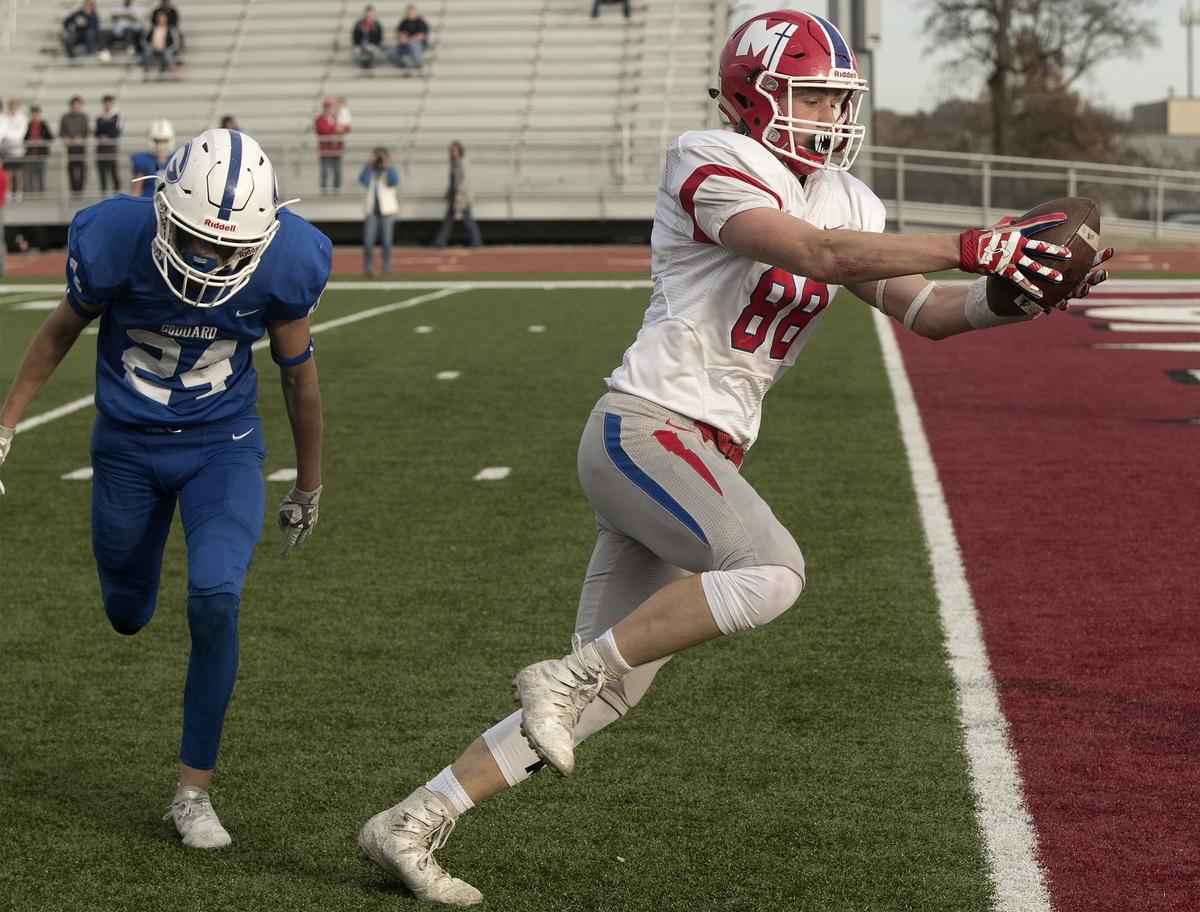 Conner Doble (88) of Bishop Miege scored another Miege touchdown in the 3rd quarter of game against Goddard in the Kansas Class 4a championship Saturday at Topeka Hummer complex. Bishop Miege won the championship.