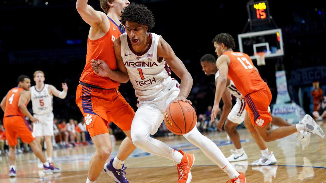 Virginia Tech’s David N’Guessan (1) drives against Clemson’s Hunter Tyson, left, in the second half of an NCAA college basketball game during the Atlantic Coast Conference men’s tournament, Wednesday, March 9, 2022, in New York. (AP Photo/John Minchillo)
