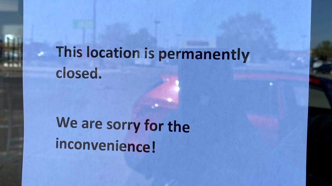 A sign in the window of the Hardee’s at 21st and Amidon on Tuesday announces the restaurant’s permanent closure.