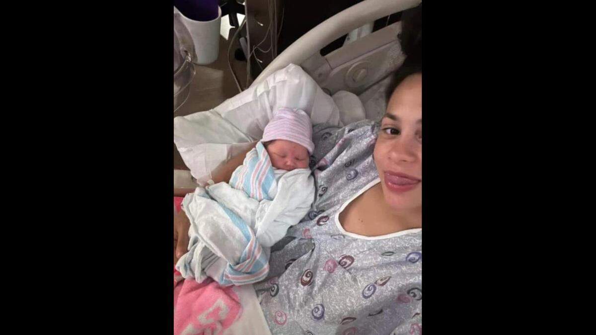 Naomi Oglesby poses for a photo with her daughter, Yazmyn Rayne Oglesby-Criscenzo, who died about six weeks after birth in 2024.