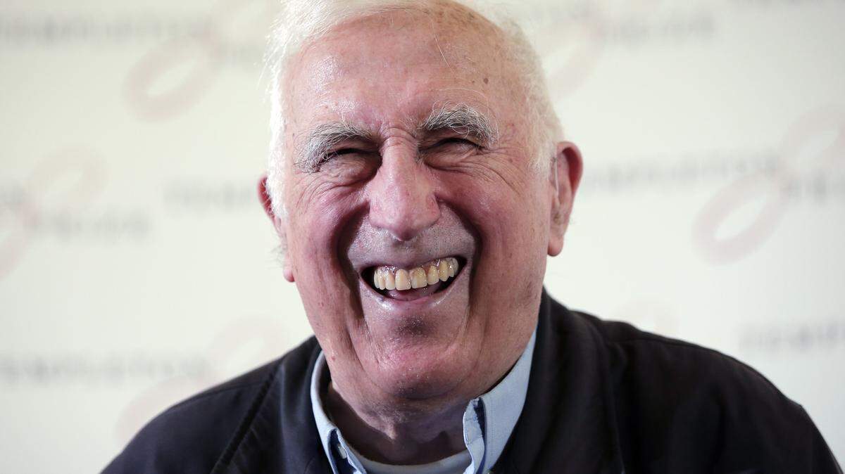 FILE - In this March 11, 2015 file photo, Jean Vanier, the founder of L’ARCHE, an international network of communities where people with and without intellectual disabilities live and work together, laughs during a news conference, in central London. Vanier, a Canadian religious figure whose charity work helped improve conditions for the developmentally disabled in multiple countries over the past half-century, has died Tuesday May 7, 2019 in Paris after suffering from thyroid cancer at 90. (AP Photo/Lefteris Pitarakis, File)
