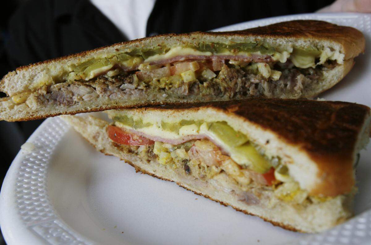 Cuban Sandwich made by Michael Gonzalez of Metro Grill in Town East Mall PHOTO BY BO RADER, The Wichita Eagle