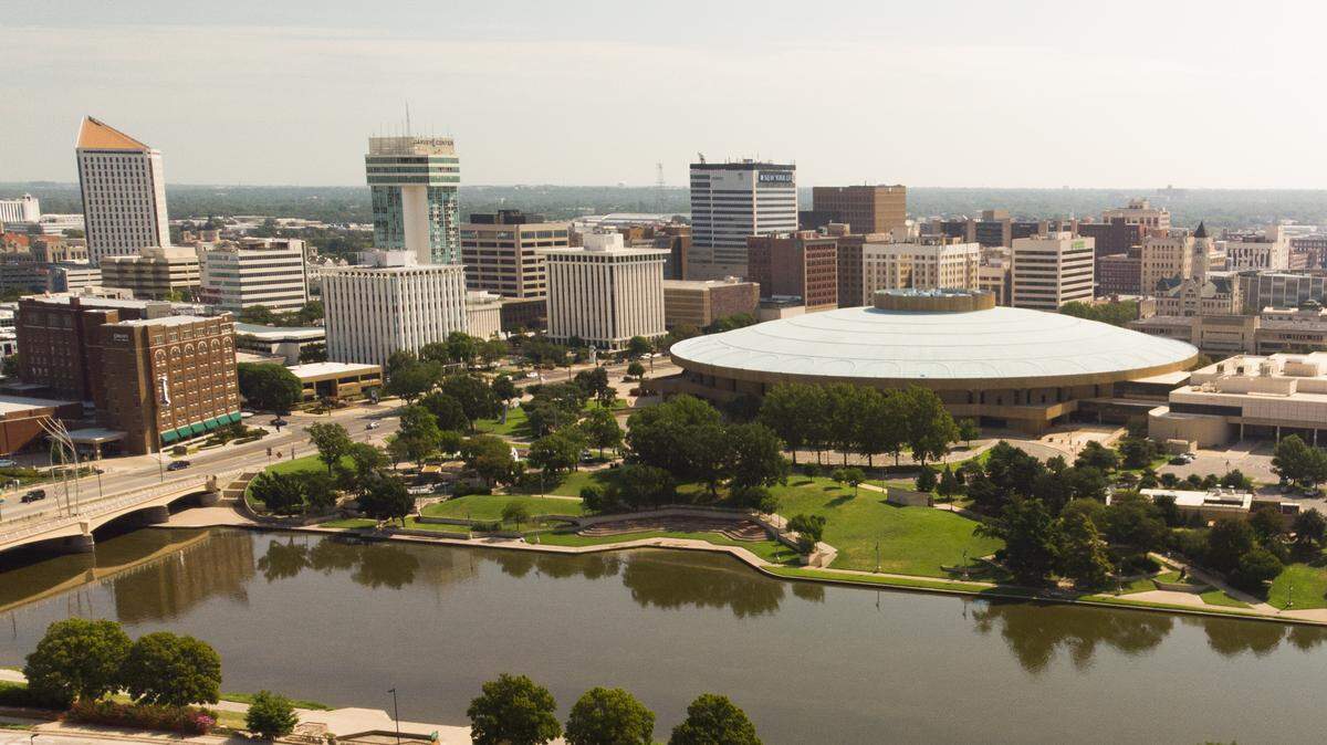 (FILE PHOTO) Downtown Wichita skyline with Century II in the center and the Arkansas River in the foreground. (Aug. 6, 2019)