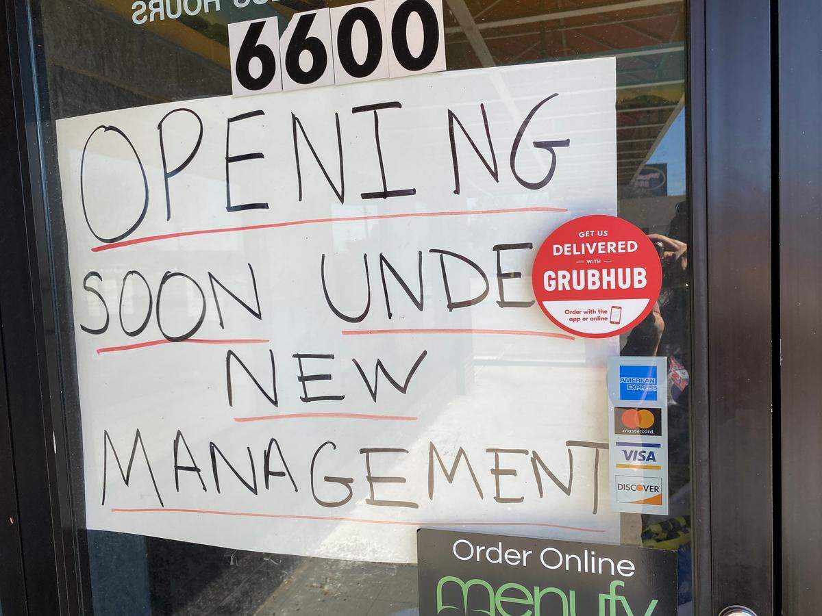 A new sign on the door at Sam’s Southern Eatery says it will reopen soon.