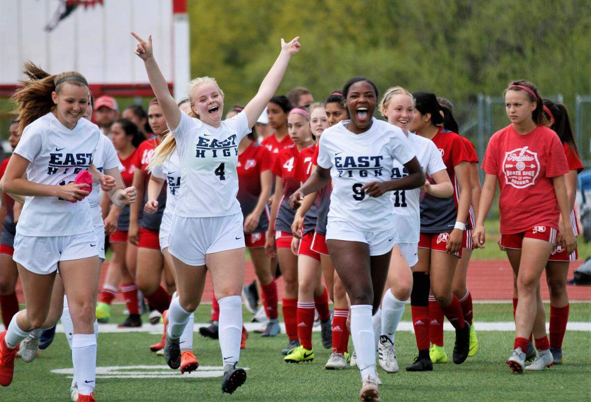 Wichita East’s Sarah Hund, Josie Goodpasture and Brynn Walker