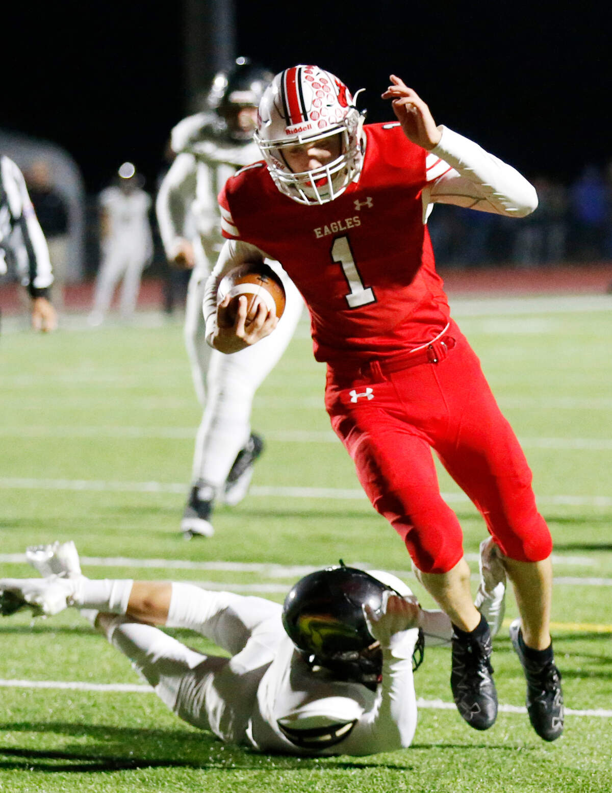 Maize quarter back #1 Caleb Grill scrambles into the end zone for a touchdown Friday night against Maize South.. (November 2, 2018)