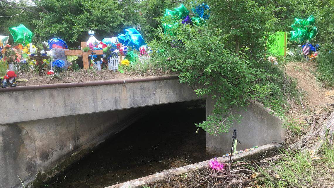 Hundreds of items wedged along a rural bridge form a 40-foot-long memorial to 5-year-old Lucas Hernandez.