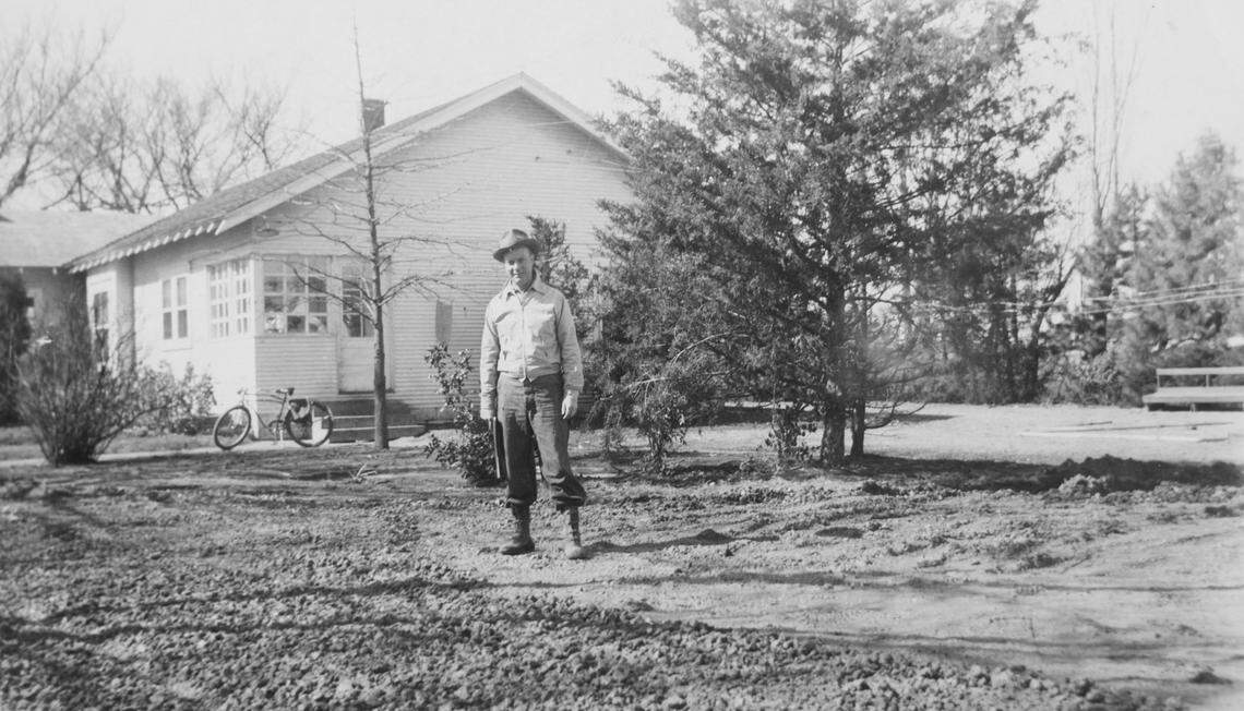 Former Hillside Nursery owner R.E. McHenry in front of the house where he raised his family. Nursery founder Fred Schnitzler and his family lived there, too. Today, the house is much more surrounded by nature and is the nursery’s office.