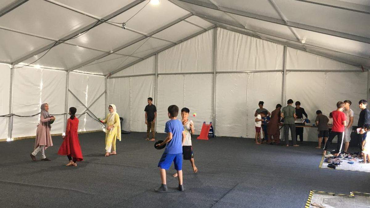 The scene at Fort Pickett in Virginia, where families evacuated from Afghanistan are being processed before heading to their new homes.