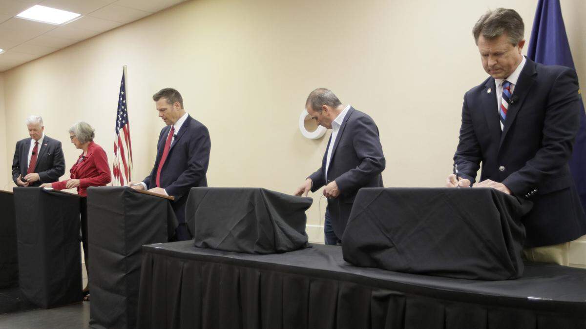 Senate candidates prepare for a GOP senatorial debate In Manhattan, Kansas on Saturday, May 23, 2020. David Lindstrom, left, Susan Wagle, second from left, Kris Kobach, middle, Bob Hamilton, second from right, and Dr. Roger Marshall, right, occupy the debate stage.