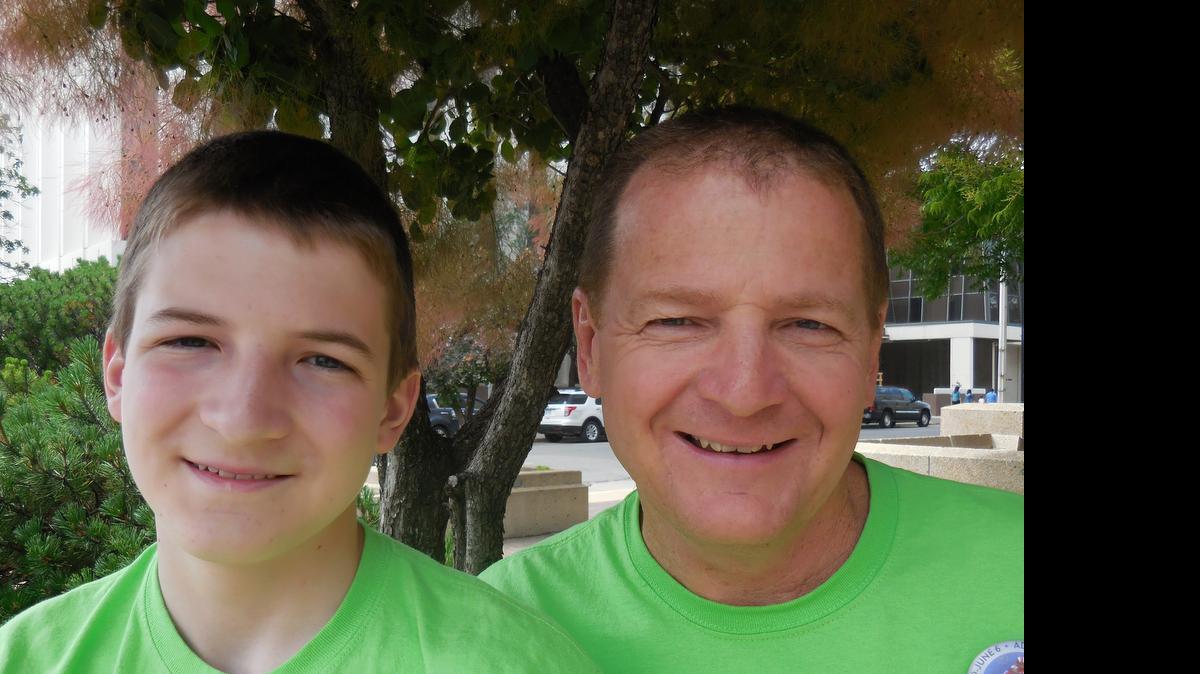 
Joseph Thom, 16, and Mike Thom, 54, of Bel Aire: 
What else they have in common: We share a love of Kansas State University football and Wichita State University basketball. We like to go camping and spent many a camp out at the Father-With-Son camp outs at Camp Kanza and Camp Brown. Joseph is Boy Scout, and I was his assistant leader through his time of being a Cub Scout. Joseph is nearing the completion of his requirements to be an Eagle Scout.
