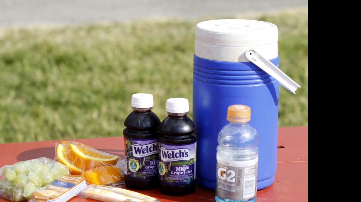 
Dietician Jill Kindy provides healthy snacks for her children who are active in basketball and baseball as well as swimming and cheering events in Kentucky. 
