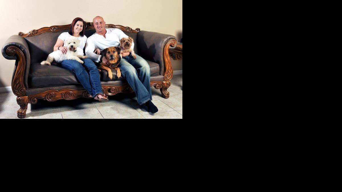 
Kris Rotonda, who founded YouMustLoveDogsDating.com, poses with his girlfriend, Denise Fernandez, and three of his four dogs: Kobe, a bichon frise; Jordan, a bull mastiff-German shepherd and Samoyed mix; and Coco, a Yorkie, in Clearwater, Fla. “Dogs on first dates are amazing icebreakers,” said Rotonda, who started the site last year.
