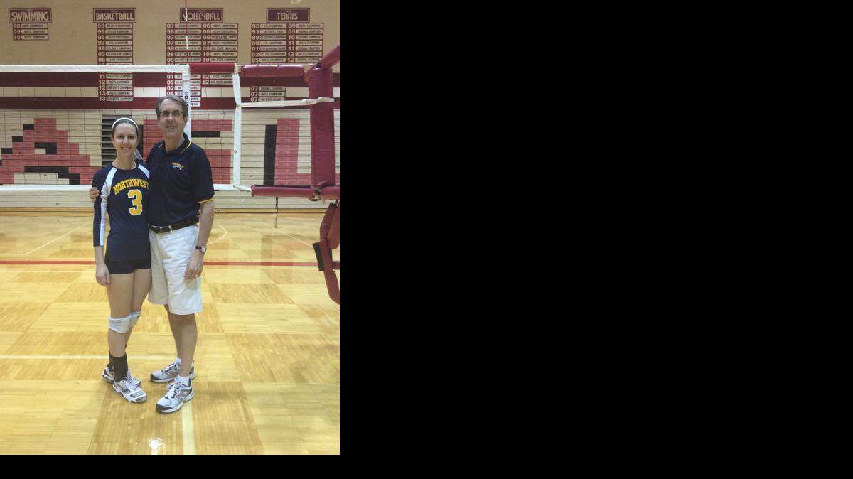 
Tom Shine with his daughter, Laura, at Maize High School last Saturday. Shine’s 20-year career as a sports parent ended at the Class 6A volleyball substate at Maize.
