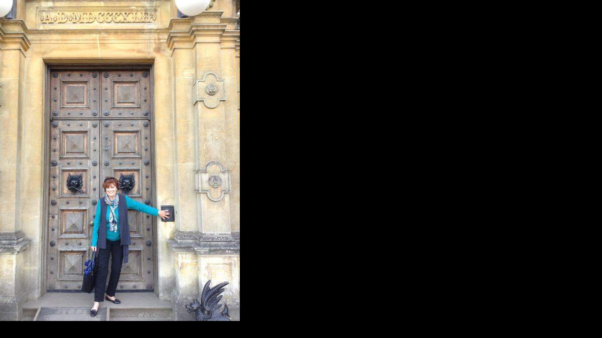 
Bonnie Bing pretends to ring the doorbell at the “Downton Abby” castle.
