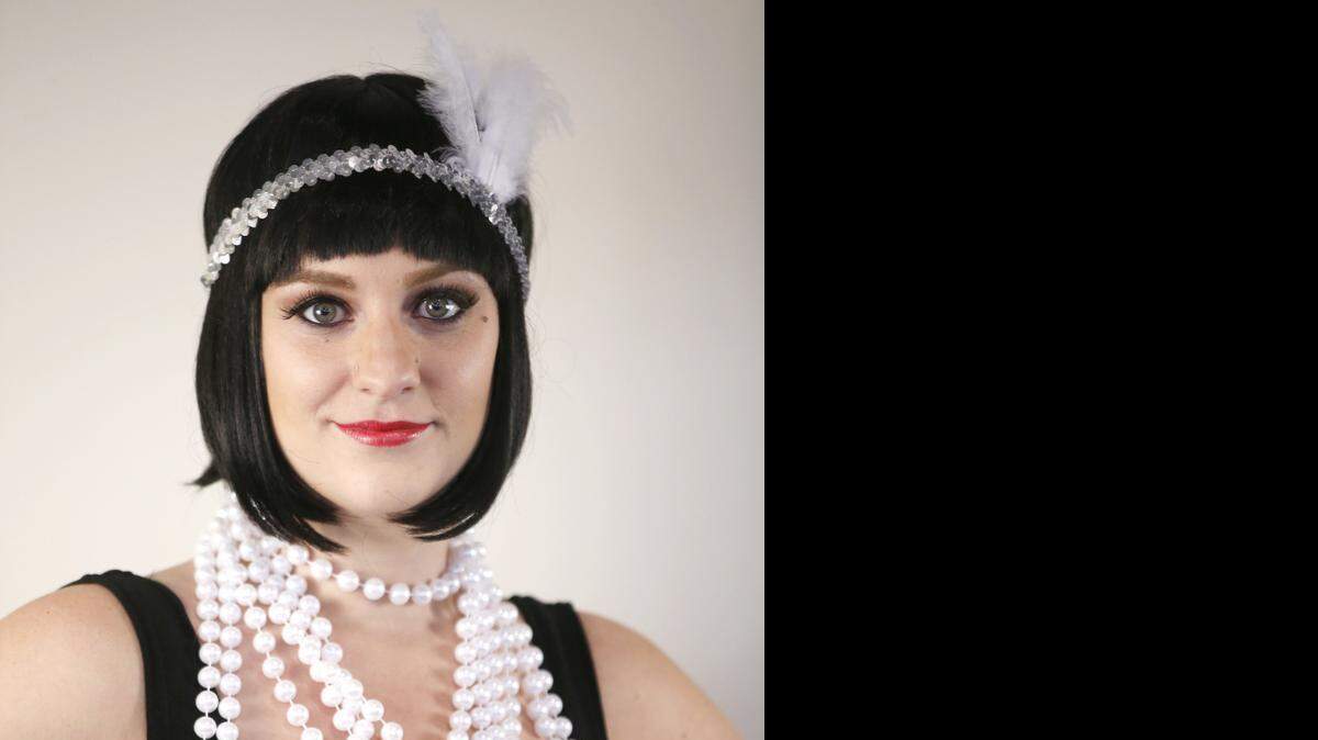 
Melanie Sims will emcee “The Evolution of Style” on Sunday at Century II. The show will feature hairstyles and fashions of various eras. Sims will sport nine different styles in the show. 
