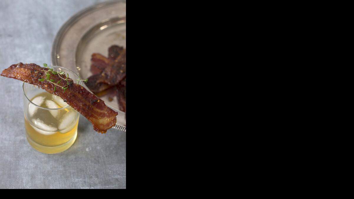 
 Not everything for New Year’s Eve needs to be fussy, bubbly or frilly. To go with Scotch whisky, try slowly candied bacon. 
