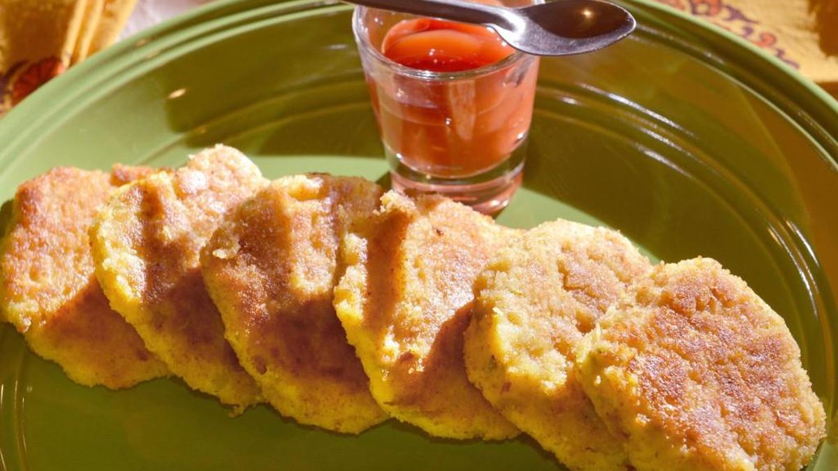 Potato-cabbage patties are made with mashed potatoes, onion and cabbage.