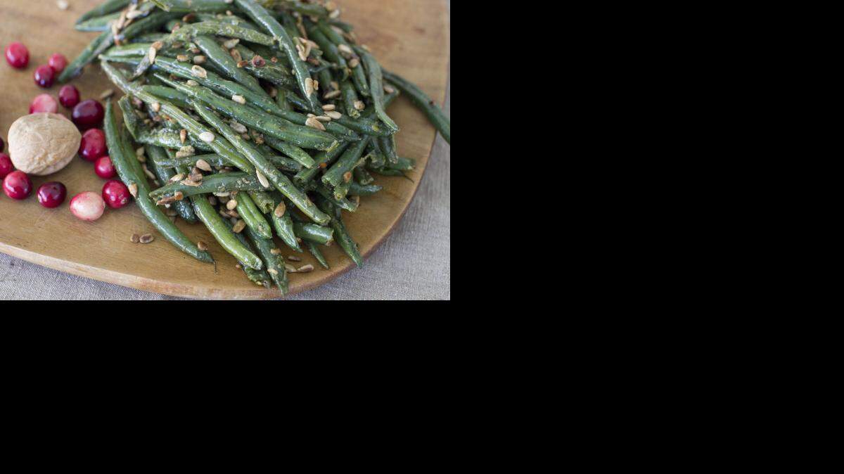 
The recipe is simple for skillet green beans bathed in brown butter, then tossed with fresh tarragon, Dijon mustard and lemon zest. 
