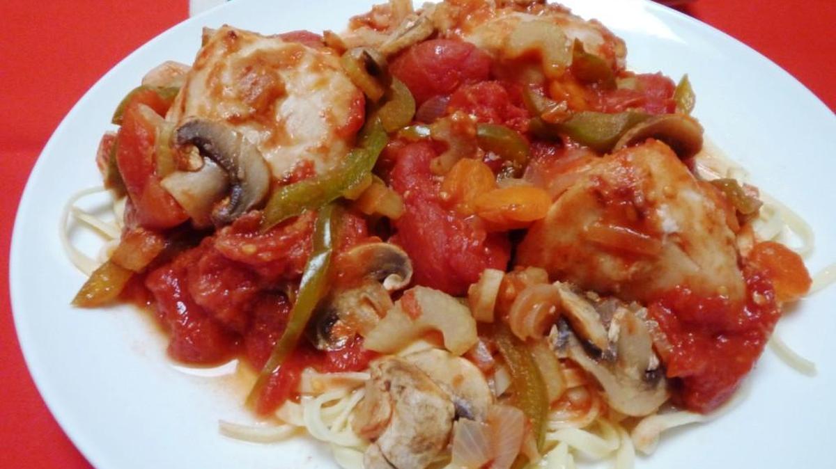 Chicken with Green Peppers and Tomatoes, or Pollo Alla Cacciatore.