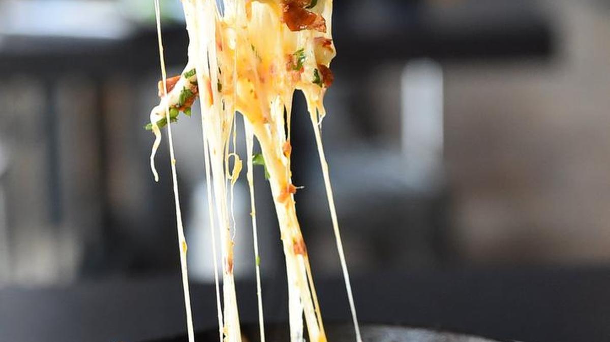 Loaded Queso Fundido is perfect for Cinco de Mayo.