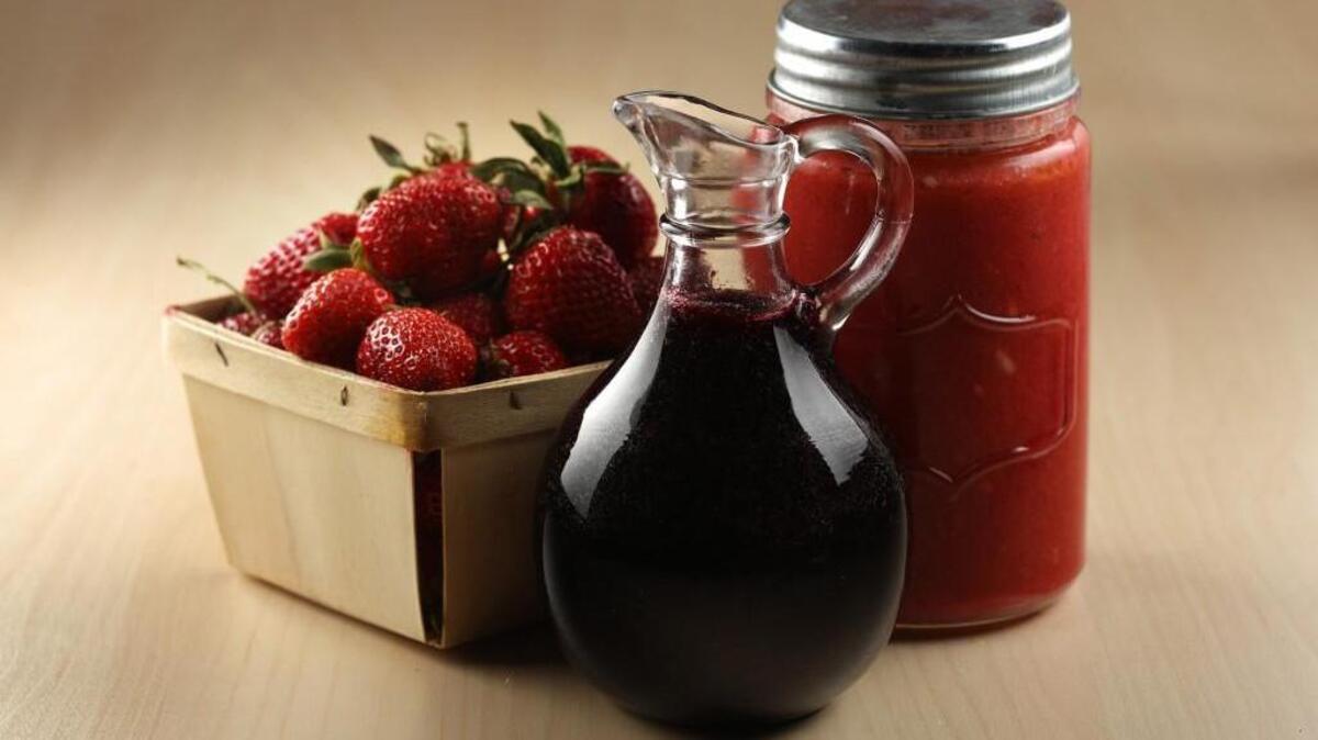 The abundance of fresh berries in early summer can be used in myriad ways. This berry syrup, center, and berry vinaigrette add their sweet-tart flavor to salads, baked goods, desserts and much more.