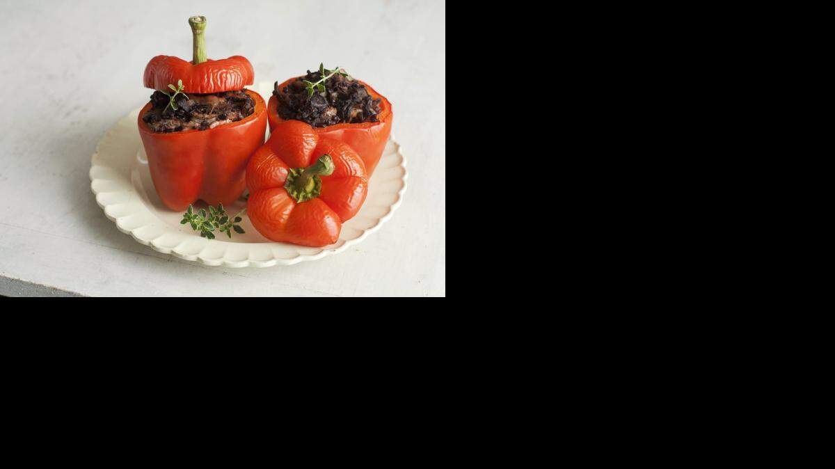 
These stuffed peppers ditch the ground beef in favor of chicken, then replace the flavorless white rice with the more robust japonica, a colorful Japanese variety. 
