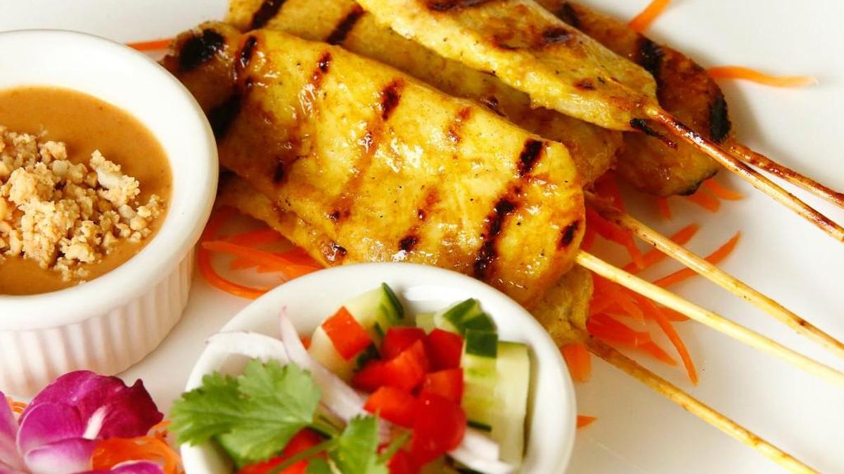 Chicken satay is even better with a peanut dipping sauce.
