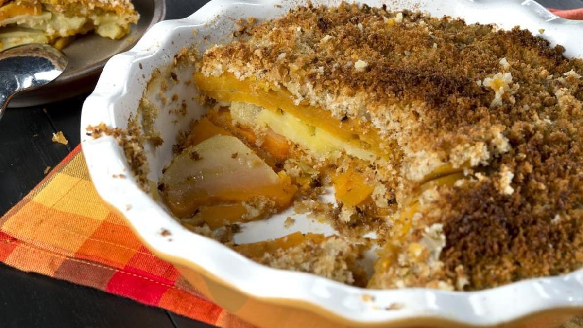 Parmesan sage crusted sweet potato gratin combines slices of Yukon gold with sweet potatoes in a layered, panko-topped dish.