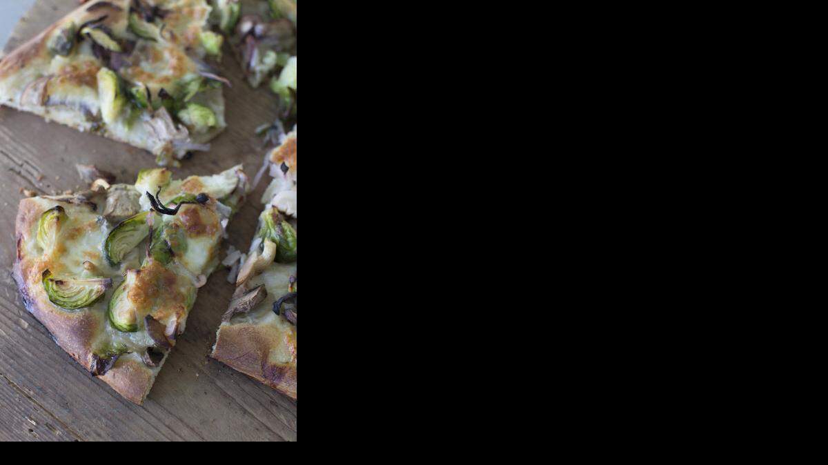 
Putting Brussels sprouts on a pizza is one way to incorporate the vegetable. 
