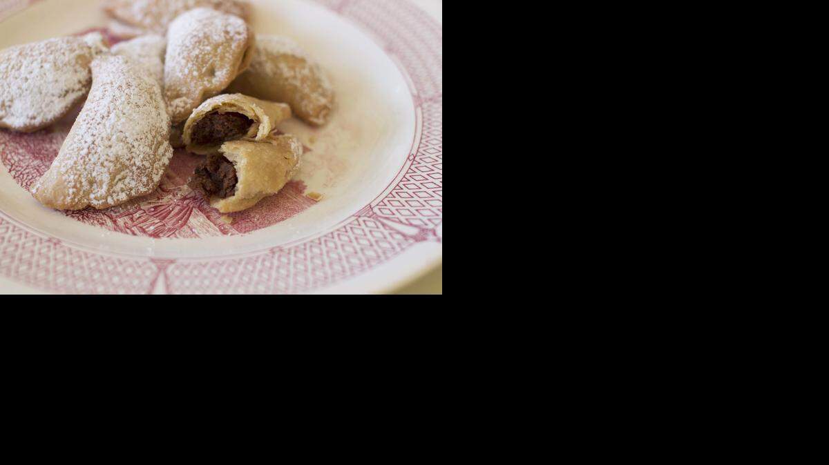 
These chocolate almond crescent cookies use white whole-wheat flour. 
