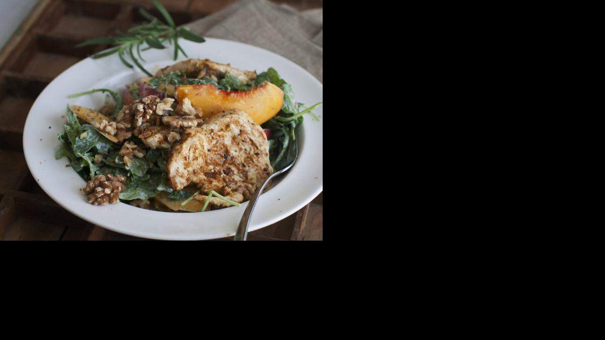 
Chicken paillard with peach and arugula salad serves as an alternative summer dish that is light, refreshing and substantial. 

