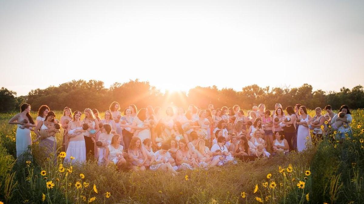 More than 60 moms and their children gathered for a mass breastfeeding photoshoot in a south Wichita sunflower field last year. Tiffany Schmidt with T.Marie Photography is planning another group photo in downtown Wichita on Friday.