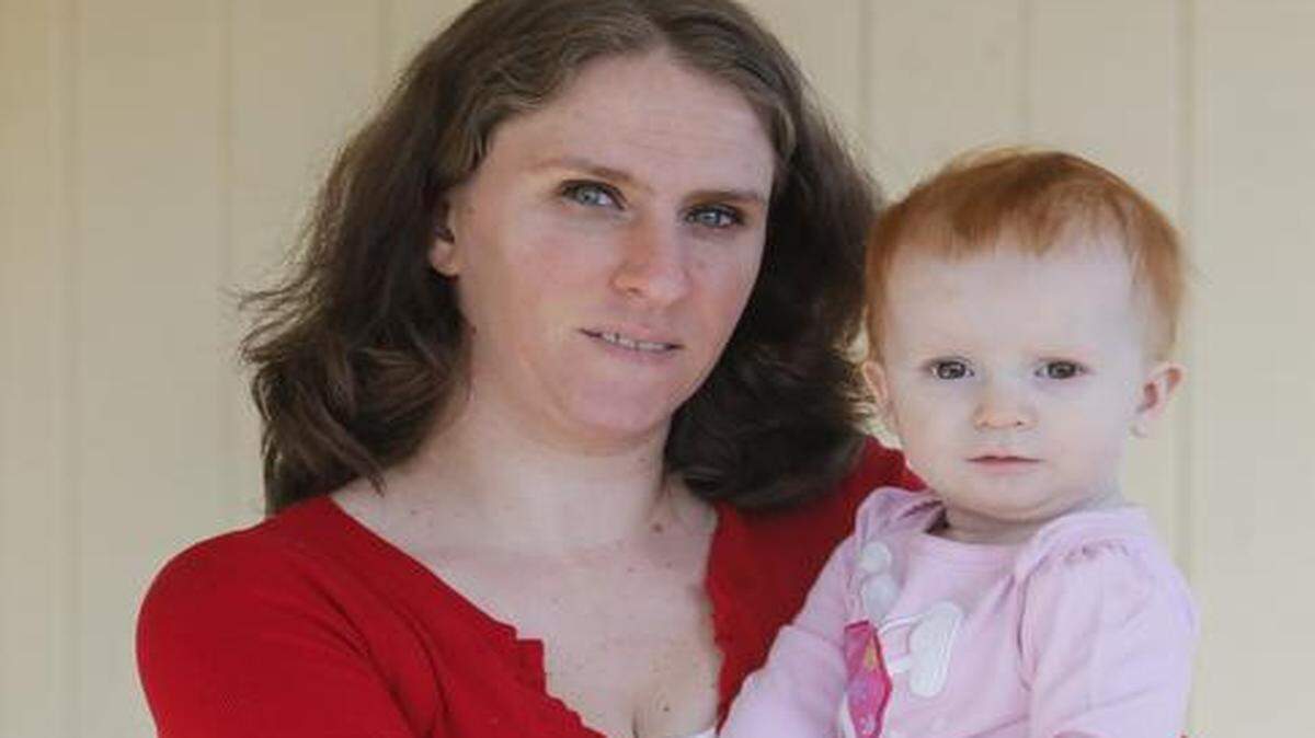 
Stacy Boring holds her “Christmas miracle,” daughter Peyton. Boring had two heart attacks at age 29.
