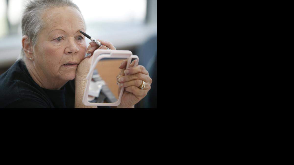 
Sisie Holliday pencils her eyebrows during a “Look Good ... Feel Better” class offered by the American Cancer Society. The class gives cancer patients tips on how to apply makeup along with a makeup bag with $250 worth of products. 
