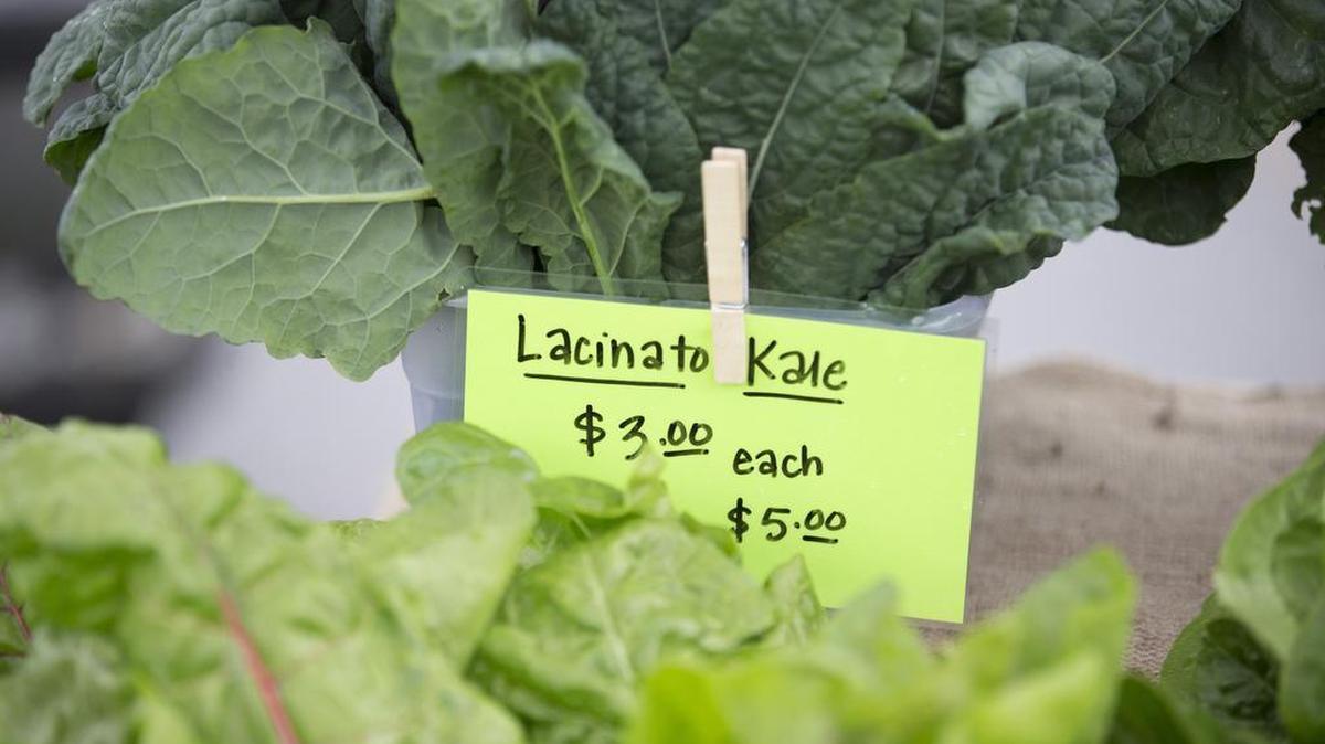 Orie’s Farm Fresh owner Wes Johnson sells fresh garden vegetables at the Farmers Market at 21st and Ridge.