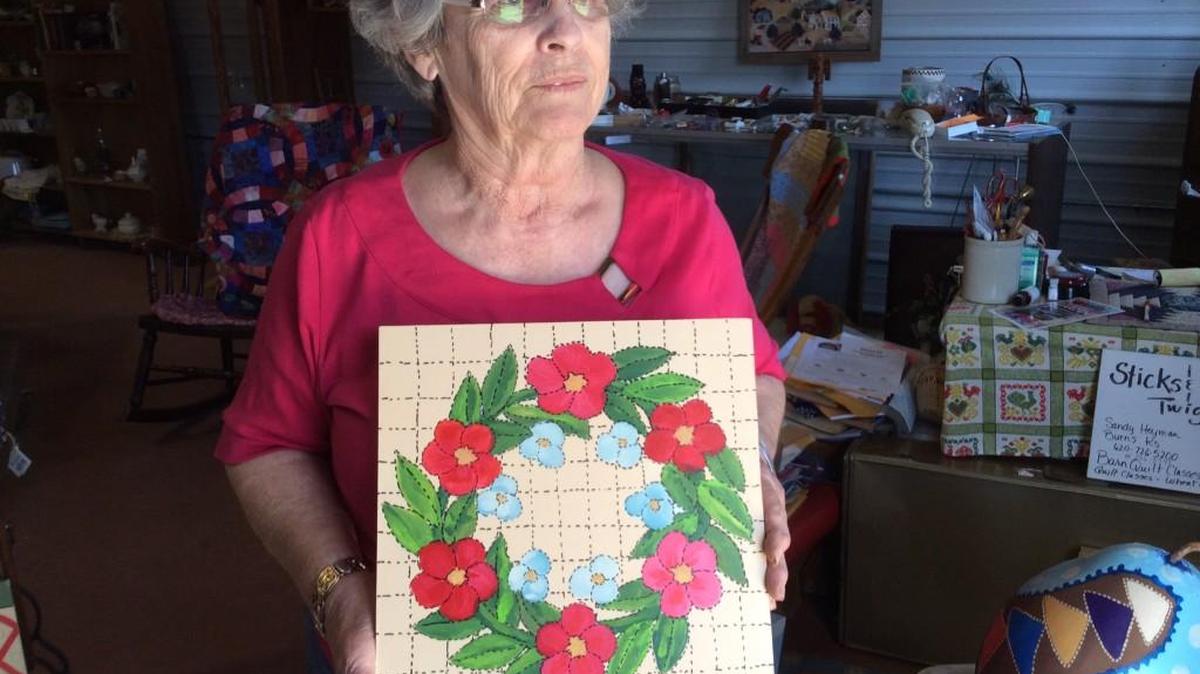 A barn quilt made by Sandy Heyman of Burns shows the gridwork that is the backdrop to making one.