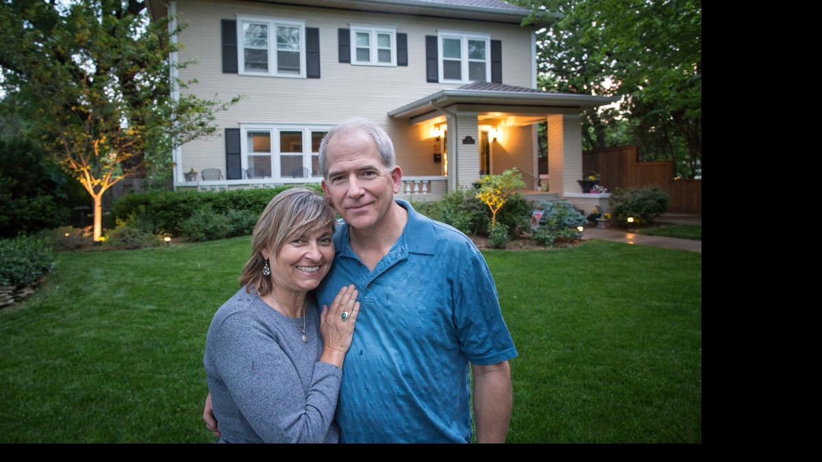 
The College Hill front yard of Robert Moore and his wife, Cheryl McGuire, is warm and welcoming even at night with landscape lighting. 
