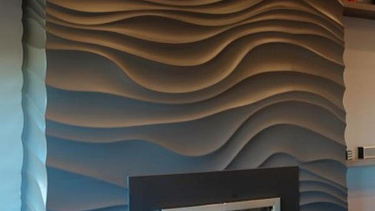 Interior Trends did this wavy resin wall application on a fireplace in a Wichita house.