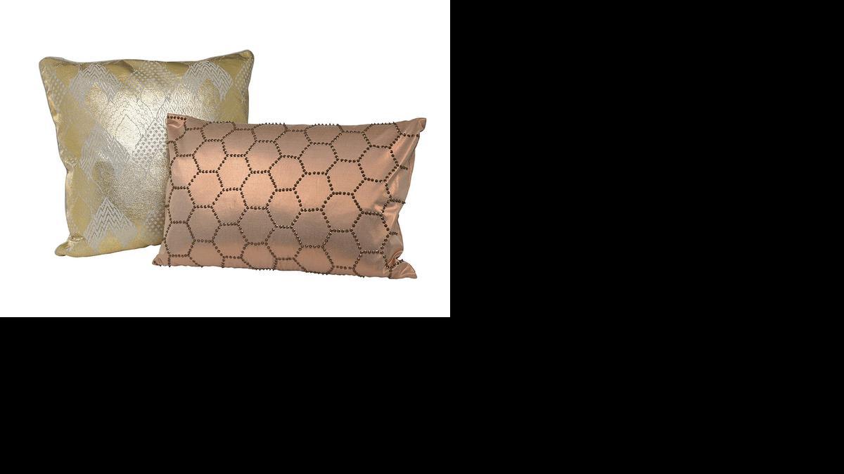 
Rose gold and a burnished metallic can be found in pillows, throws and other accessories this fall from homegoods.com. 
