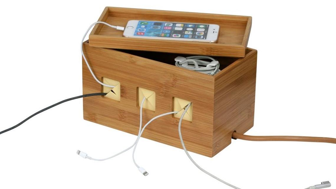 
Cord clutter is the pet peeve of designers and homeowners everywhere. “I can’t stand tangled-up cords behind tables and things all over a living room or a family room,” designer Patrick Baglino Jr. says. He likes the bamboo Cable Cubby to hide cords and power strips and has two in his home. 
