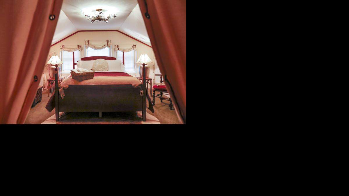 
Curtains frame the entrance to a cocoon-like, canvas-wrapped bedroom at the Inn at Glenstrae, a bed-and-breakfast in Wichita’s Sleepy Hollow neighborhood.
