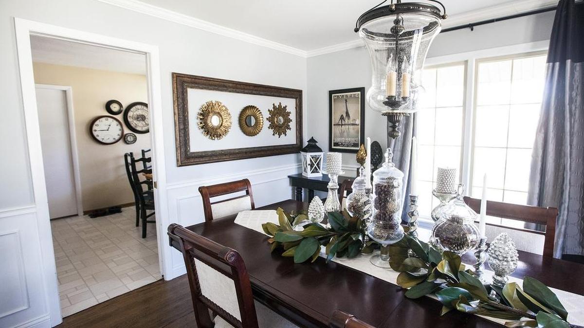 Pinterest ideas in the Sauer home: a large frame holding smaller mirrors, and a centerpiece that can be changed out seasonally in the dining room, and a wall of clocks in the kitchen nook.