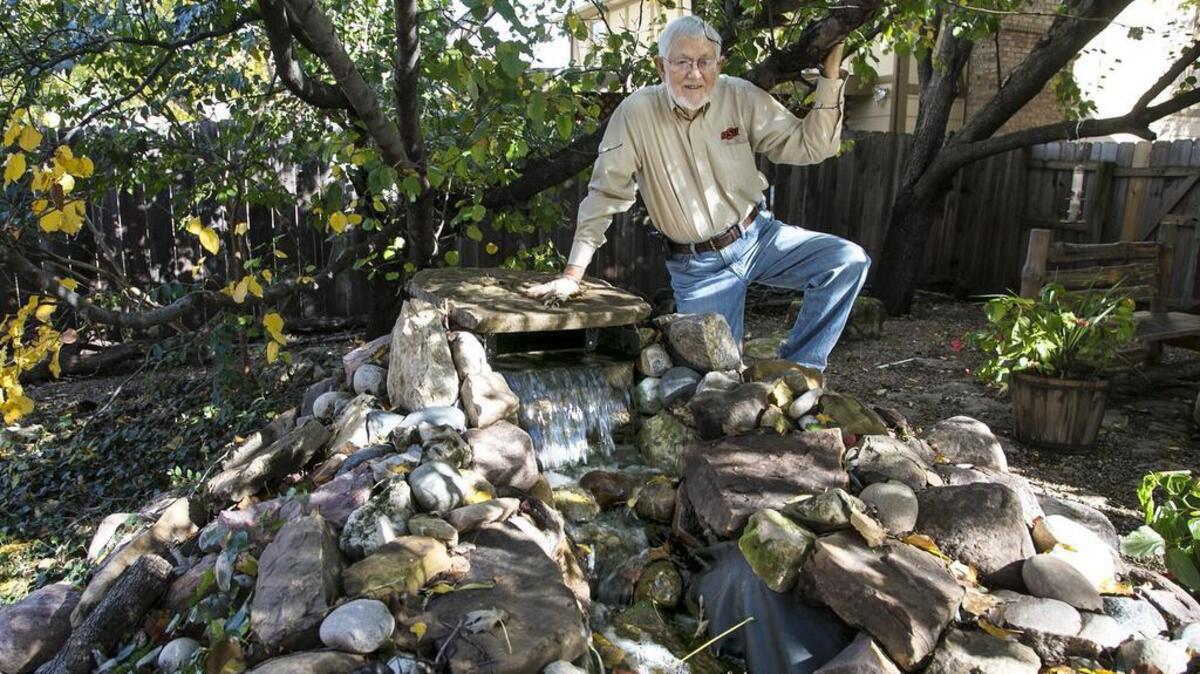 Lynn Jones built a waterfall in his backyard after researching how to line ponds, how to build a waterfall and how pumps work.