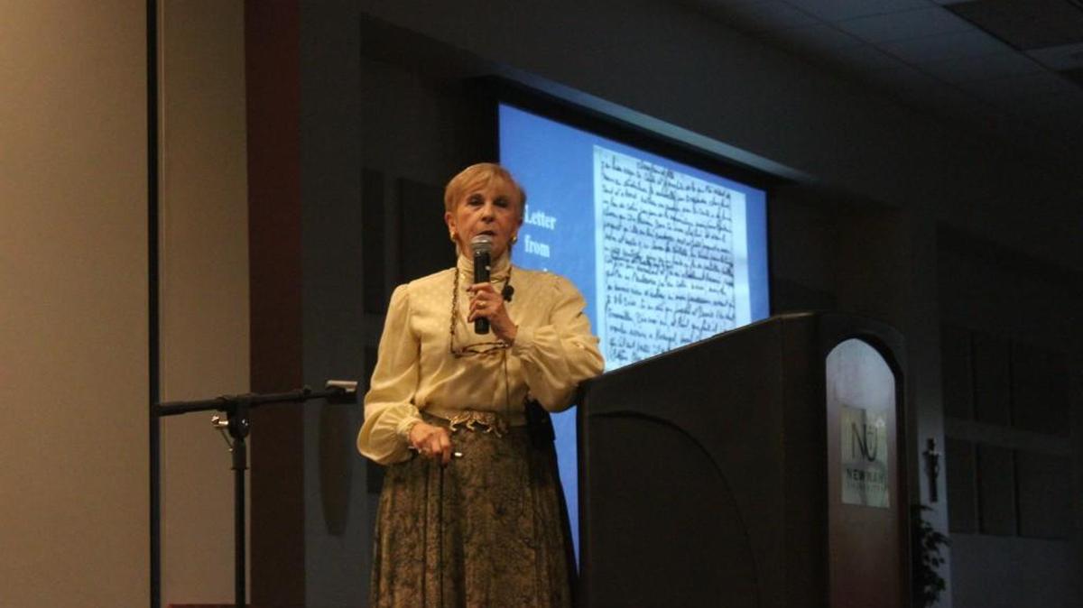 Rachel Goldman Miller, a Holocaust survivor, tells her story Wednesday at ‘Stolen Innocence,’ a Holocaust commemoration event at Newman University.