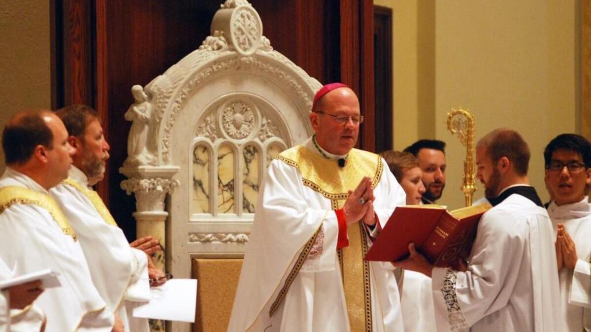 Bishop Carl Kemme conducts a service in 2015.