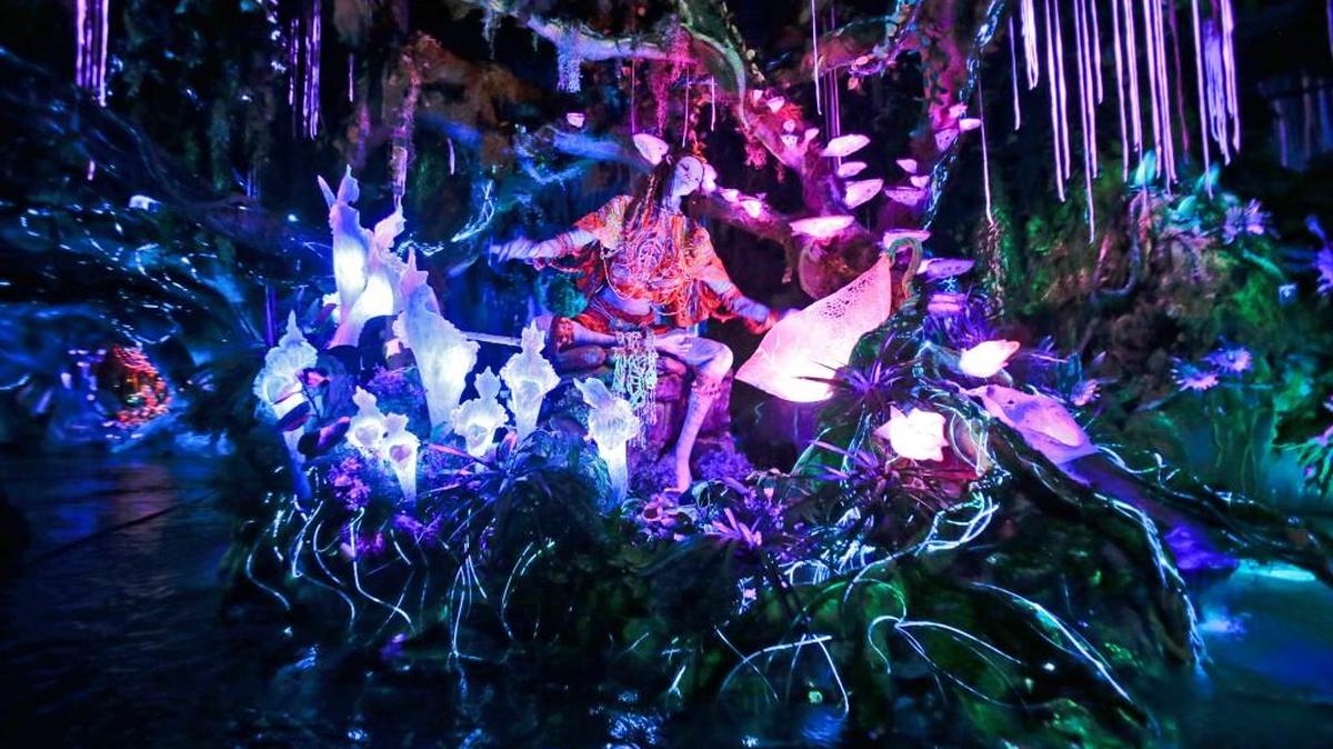 The Na’vi Shaman of Songs celebrates with music in Na’vi River Journey ride at Pandora-World of Avatar land attraction in Disney’s Animal Kingdom theme park at Walt Disney World in Lake Buena Vista, Fla.